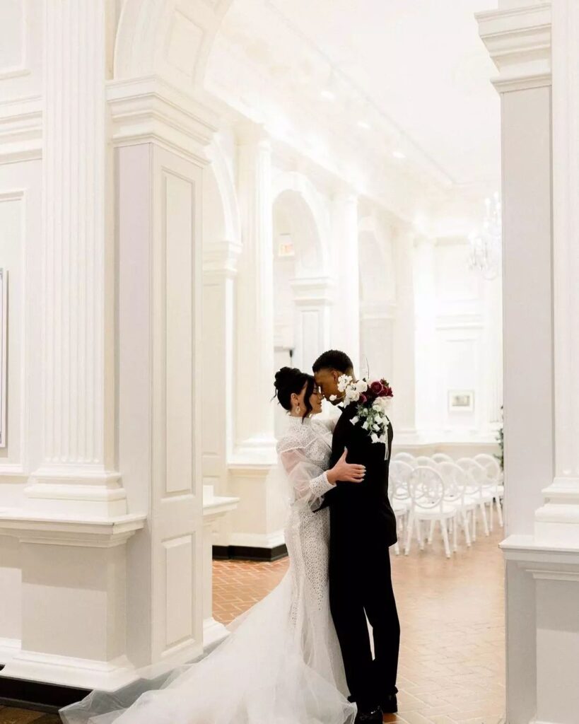 Chicago History Museum Wedding with wintery design featuring white and red florals