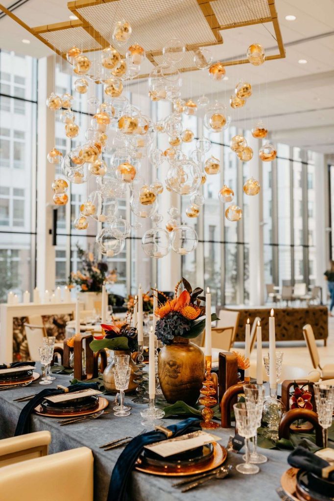 Copper textured chargers with rich blue linen accesnts